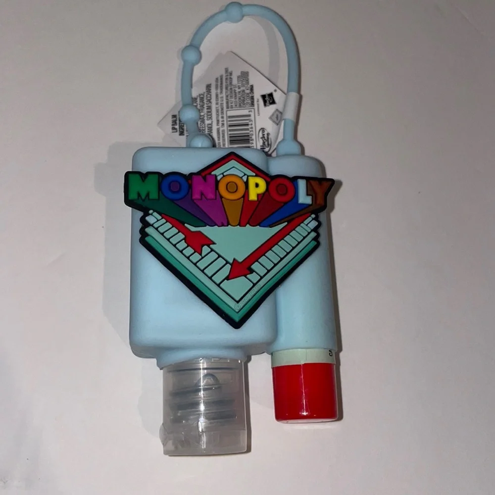 Monopoly carrying case with hand sanitizer and lip balm